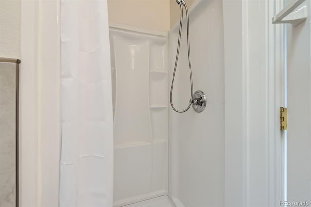 8644 S Brentwood St, Littleton, CO 80128 - full bathroom featuring a shower stall