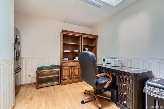 8644 S Brentwood St, Littleton, CO 80128 - home office with wainscoting and light wood-style flooring
