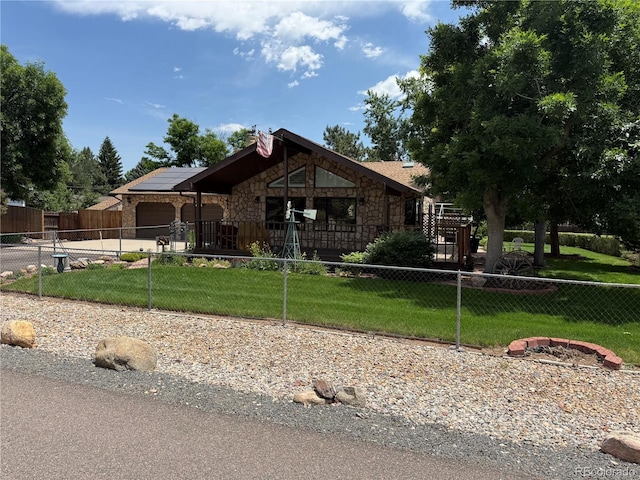 8644 S Brentwood St, Littleton, CO 80128 - view of front of property with stone siding and roof mounted solar panels