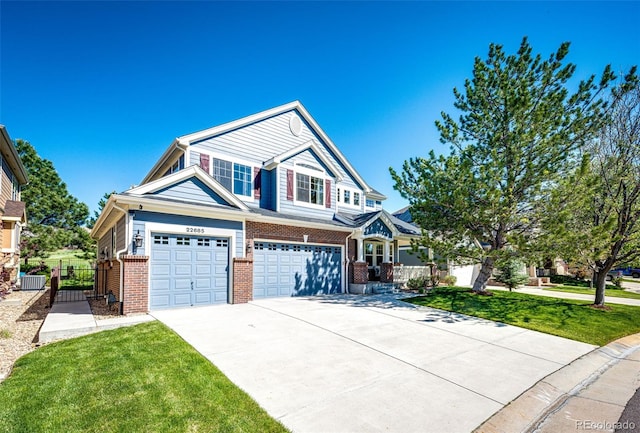 22685 E Calhoun Pl, Aurora, CO 80016 - view of front facade featuring an attached garage, brick siding, concrete driveway, and cooling unit