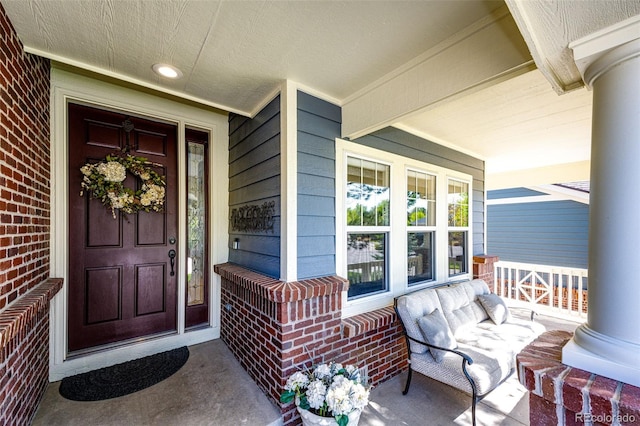 22685 E Calhoun Pl, Aurora, CO 80016 - entrance to property featuring a porch and brick siding