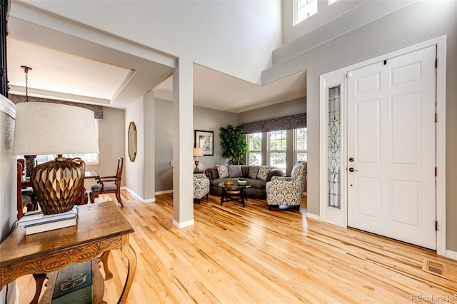 22685 E Calhoun Pl, Aurora, CO 80016 - entrance foyer with light wood-style floors and baseboards