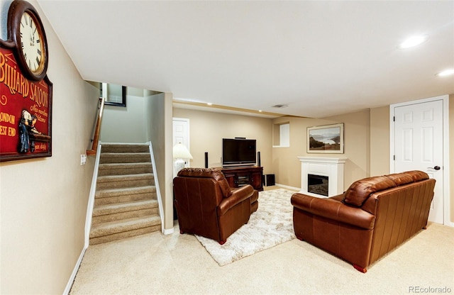 22685 E Calhoun Pl, Aurora, CO 80016 - living area featuring carpet floors, baseboards, recessed lighting, stairs, and a fireplace