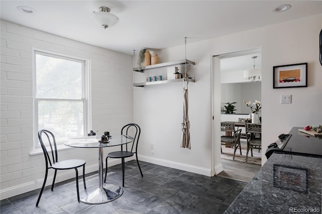 420 S Marion Pkwy Unit 203, Denver, CO 80209 - dining area with baseboards
