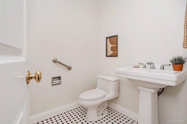 420 S Marion Pkwy Unit 203, Denver, CO 80209 - half bathroom with toilet and baseboards