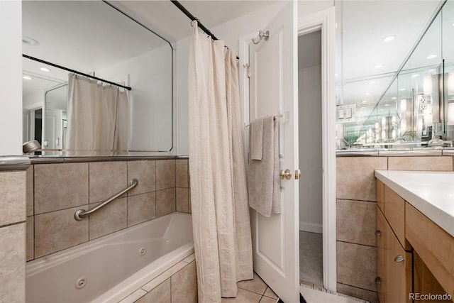 420 S Marion Pkwy Unit 203, Denver, CO 80209 - full bathroom featuring vanity, tile patterned flooring, and a combined bath / shower with jetted tub