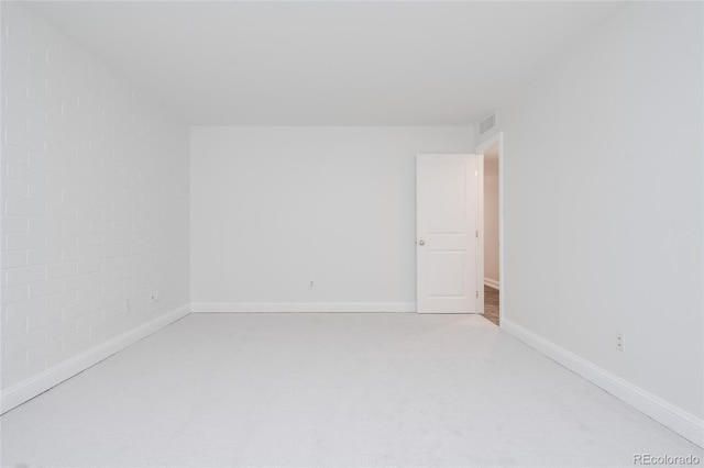 420 S Marion Pkwy Unit 203, Denver, CO 80209 - empty room featuring carpet floors and baseboards