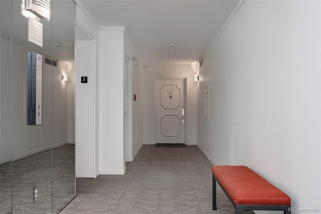420 S Marion Pkwy Unit 203, Denver, CO 80209 - corridor featuring carpet flooring and ornamental molding