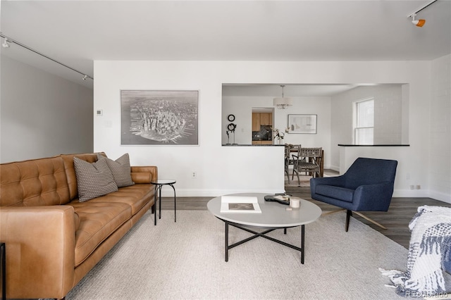 420 S Marion Pkwy Unit 203, Denver, CO 80209 - living area featuring track lighting and wood finished floors