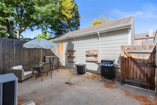 exterior space with fence and area for grilling