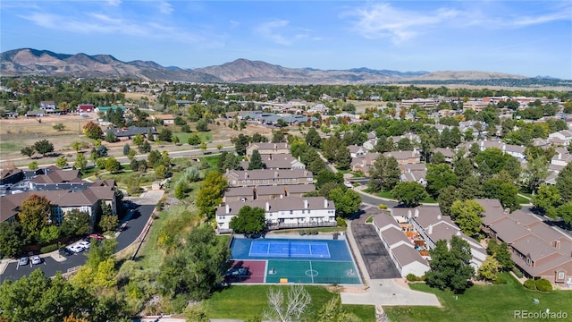 drone / aerial view with a residential view and a mountain view