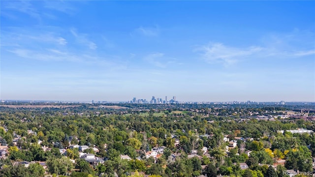 birds eye view of property with a city view