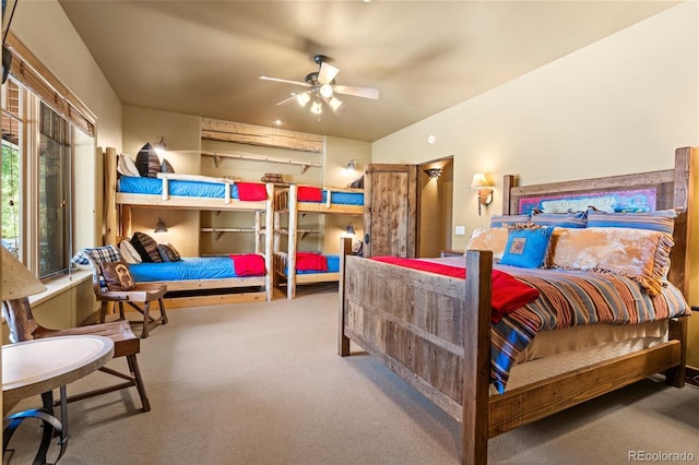 bedroom featuring ceiling fan and carpet floors