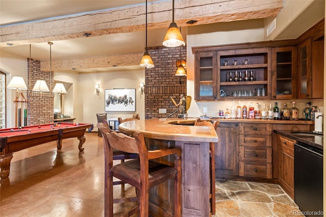 bar with brick wall, sink, decorative light fixtures, billiards, and dishwasher