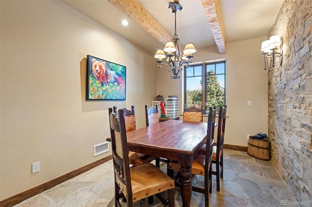 dining space featuring beam ceiling, a chandelier, and hardwood / wood-style flooring