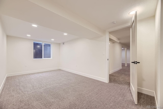 basement with carpet flooring