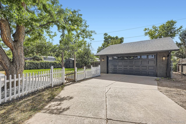 garage with a yard