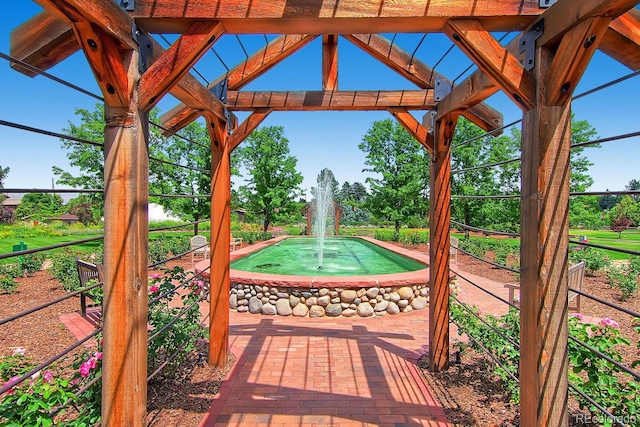 view of patio / terrace featuring a pergola