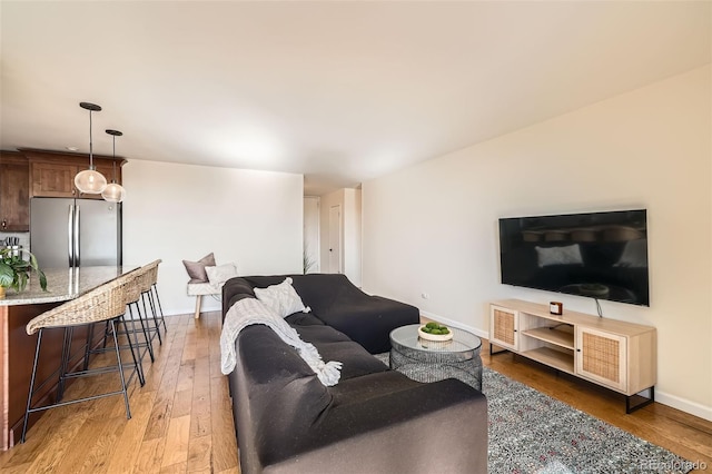 living room featuring dark hardwood / wood-style floors