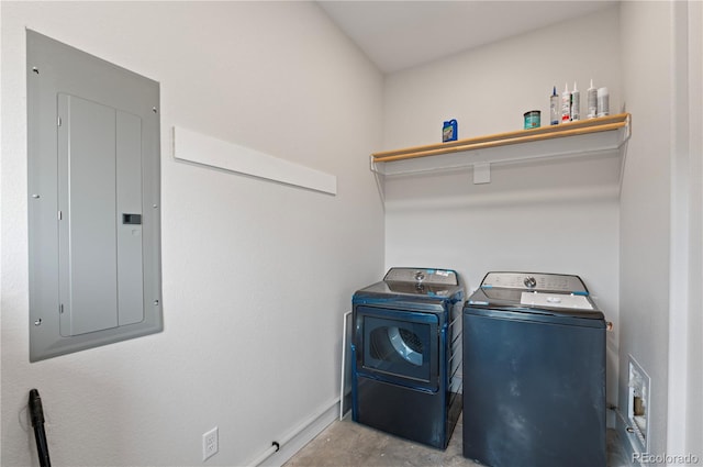 laundry area featuring electric panel and washer and clothes dryer