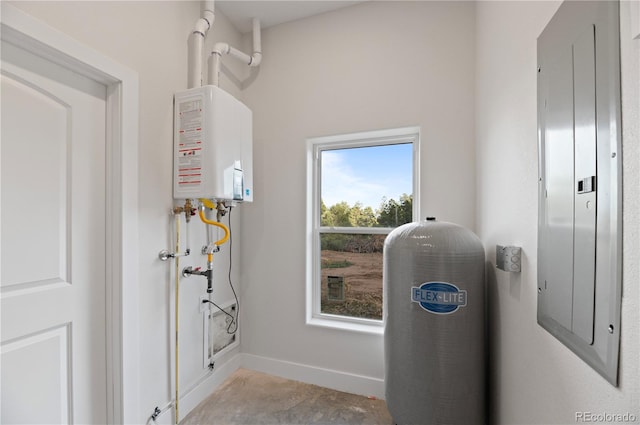 utilities with water heater and electric panel