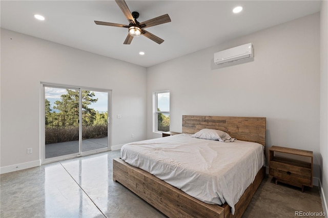 bedroom with a wall unit AC, access to exterior, concrete floors, and ceiling fan