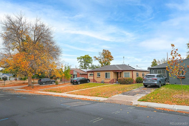 view of front of home with a front yard