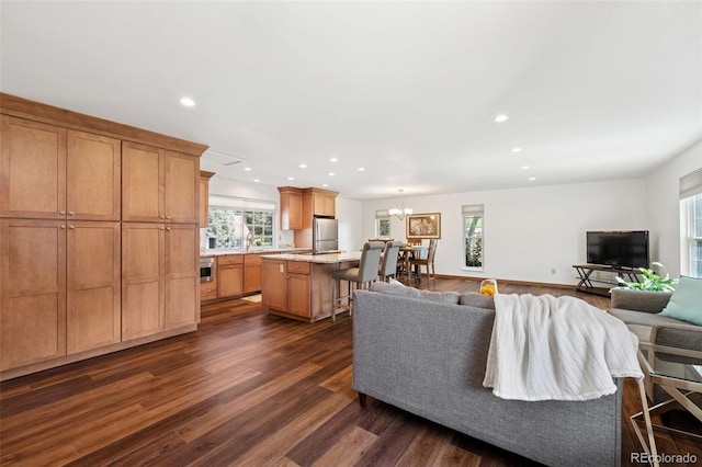 16 Scott Dr N, Broomfield, CO 80020 - living room featuring healthy amount of natural light, recessed lighting, and dark wood-style flooring