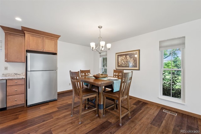16 Scott Dr N, Broomfield, CO 80020 - dining space featuring a chandelier, dark wood finished floors, and recessed lighting