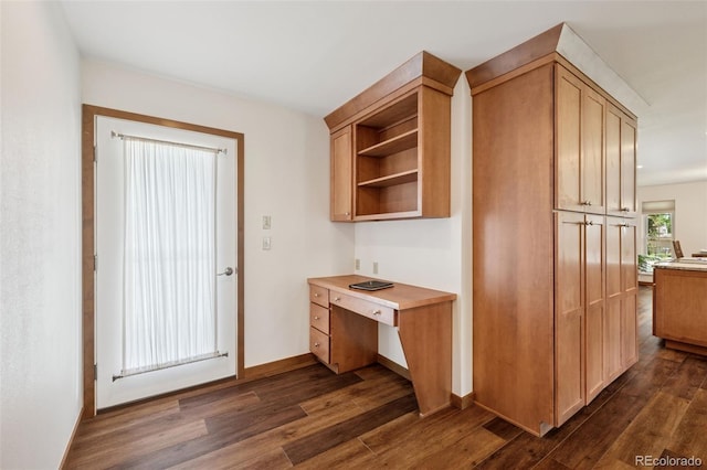 16 Scott Dr N, Broomfield, CO 80020 - kitchen featuring dark wood-style flooring, open shelves, light countertops, and a desk