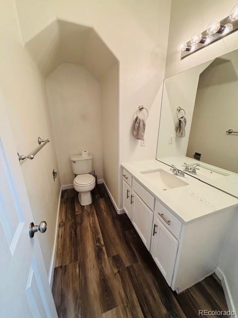 12225 E 2nd Dr, Aurora, CO 80011 - bathroom with wood finished floors and vanity