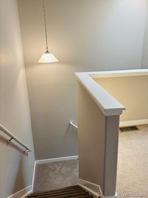 12225 E 2nd Dr, Aurora, CO 80011 - stairs with carpet