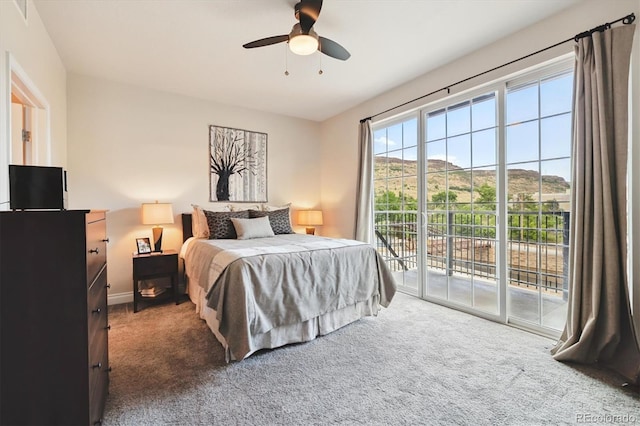 620 11th St Unit 206, Golden, CO 80401 - carpeted bedroom with access to exterior and ceiling fan