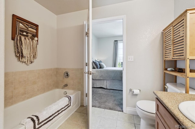 620 11th St Unit 206, Golden, CO 80401 - bathroom featuring ensuite bath, a bath, vanity, and tile patterned floors