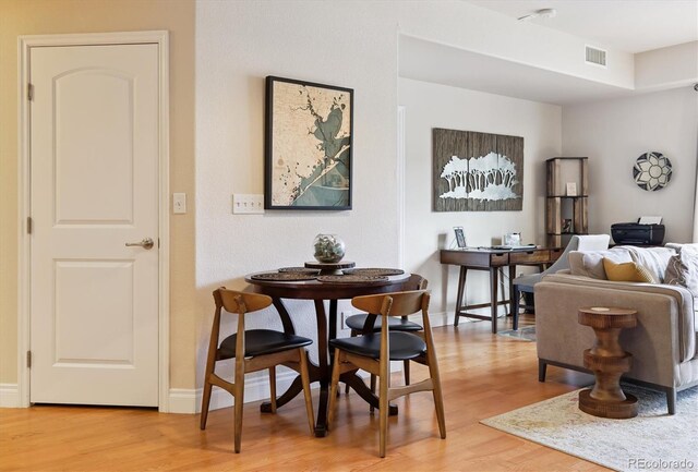 620 11th St Unit 206, Golden, CO 80401 - dining room with light wood finished floors and baseboards