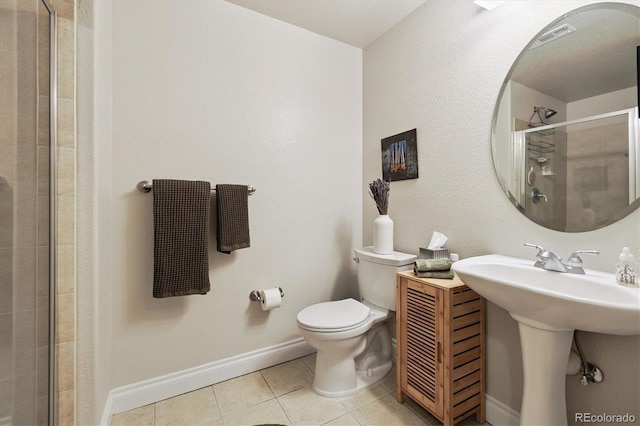 620 11th St Unit 206, Golden, CO 80401 - bathroom with tile patterned floors and a tile shower