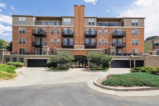 620 11th St Unit 206, Golden, CO 80401 - view of apartment building / complex featuring driveway