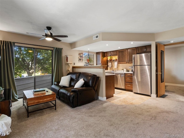 12476 W Nevada Pl Unit 106, Lakewood, CO 80228 - living room featuring light carpet, ceiling fan, recessed lighting, and baseboards