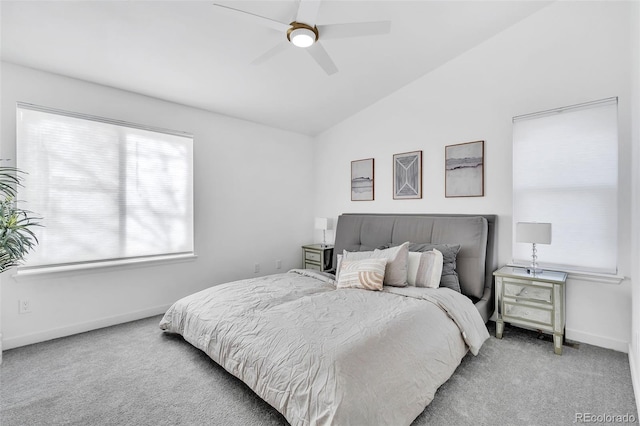 carpeted bedroom featuring lofted ceiling and ceiling fan