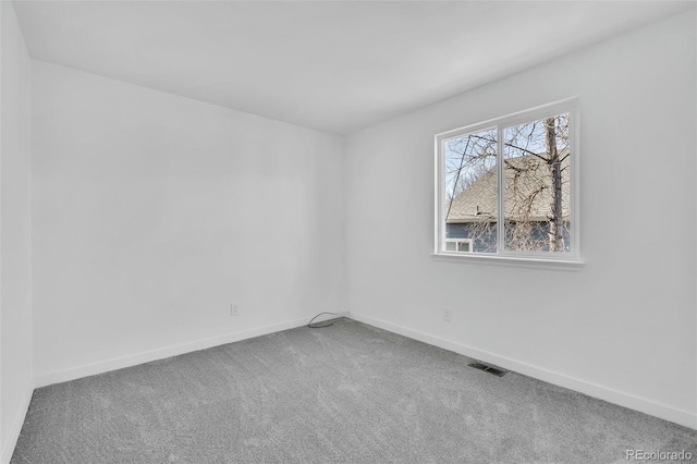 unfurnished room featuring carpet floors