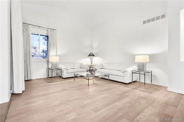 unfurnished living room with light hardwood / wood-style floors