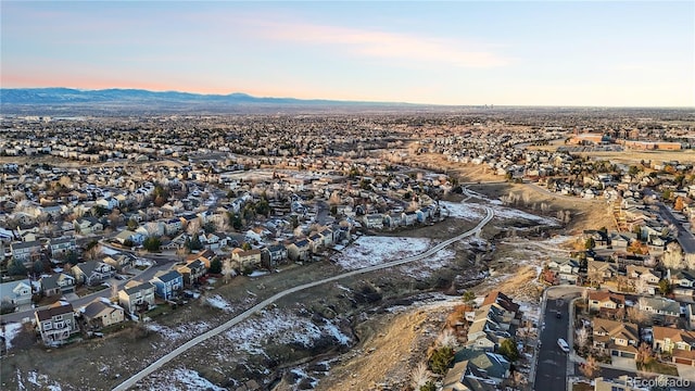 aerial view at dusk with a mountain view