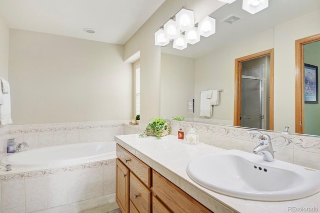 full bath featuring a shower stall, vanity, visible vents, and a bath