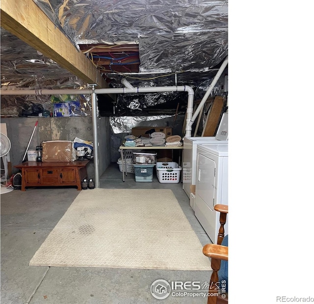 storage area featuring washer / clothes dryer