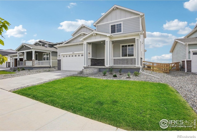 view of front of property with a porch, board and batten siding, and a front yard