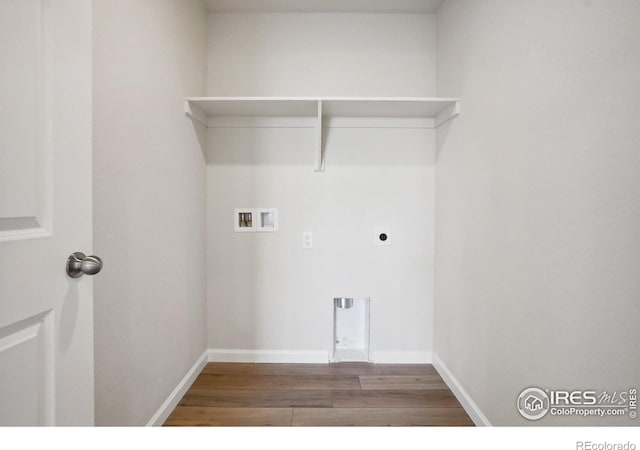 laundry room featuring laundry area, washer hookup, wood finished floors, baseboards, and electric dryer hookup