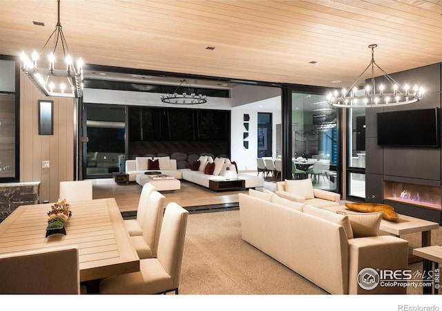 dining area featuring wood ceiling and a wall of windows