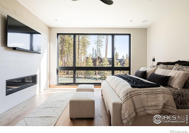 bedroom with light wood-type flooring