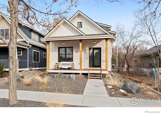 modern farmhouse featuring a porch