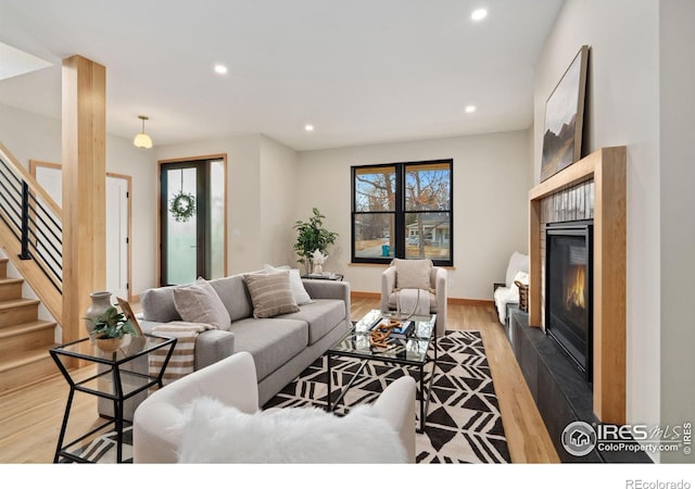 living room with light hardwood / wood-style flooring